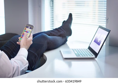 lazy office worker playing mobile 260nw 633419849